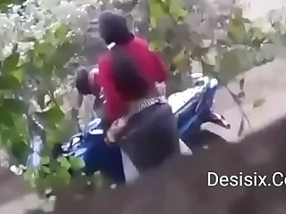 Desi couple standing have a passion in forest