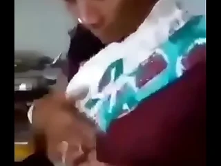 indian aunty is showing her boobs to nephew nephew is capturing it and kissing her